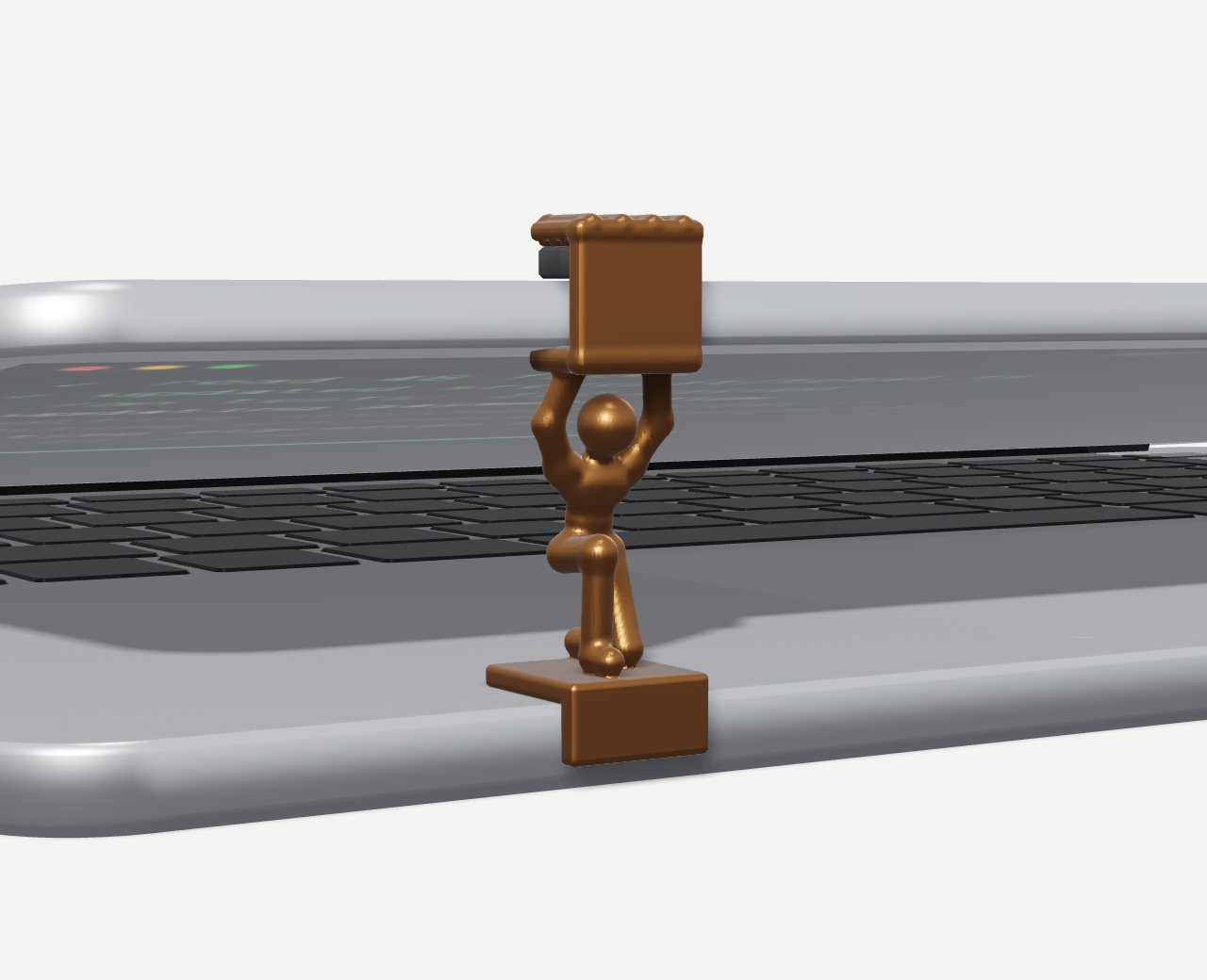 Propt Atlas, a small bronze figure, holding a silver laptop's lid open